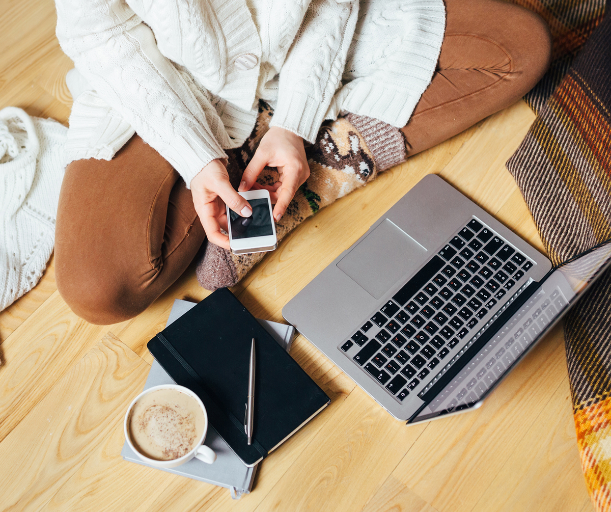 Girl on iPhone and MacBook | Website Design